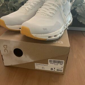 On Running White Sneakers with Subtle Accents